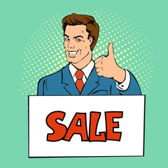 Happy businessman man shows thumb up