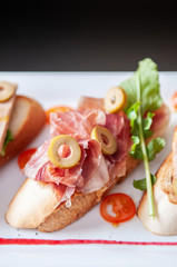 Carpaccio bread Pamaham rocket lettuce and cranberries sauce