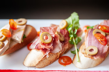 Carpaccio bread Foie gras, Pamaham, smoked duck bread and cranberries sauce