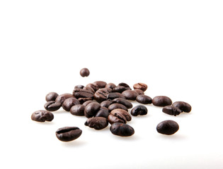 Roasted Coffee Beans Over White Background