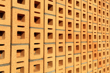 Yellow hollow brick wall