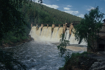 Old dam on a mountain river