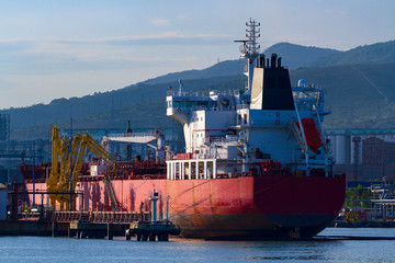 Oil or chemical tanker in a port, evening light