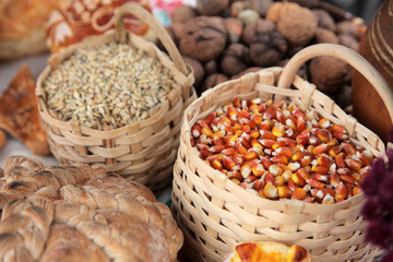 Fototapeta na wymiar Basket with wheat and maize