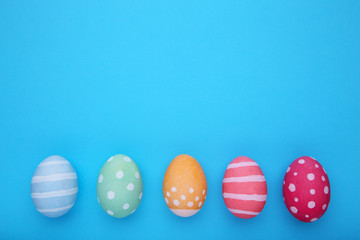 Colorful easter eggs on a blue background