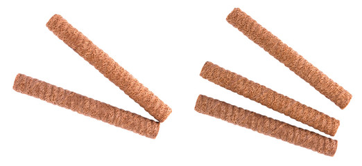 Waffle rolls with chocolate cream on white background