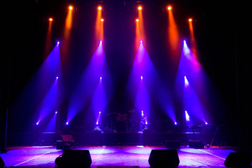 Empty stage. Multicolored lights, light show at the Concert.