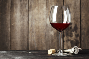 Glass of Wine on The Wooden Table