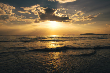 Landscape tropical sunset on the beach. Ao Nang, Krabi province, Thailand