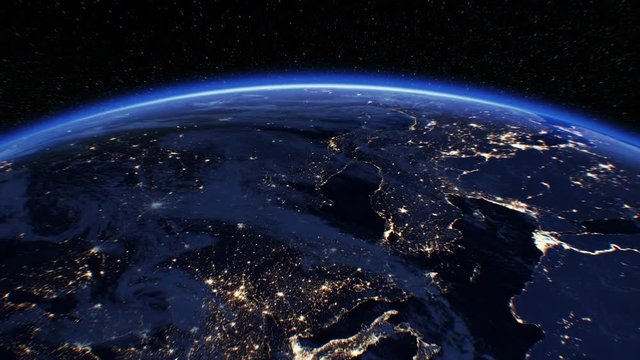 Beautiful Sunrise over the Earth. View from Space Satellite. Cities at Night. Changing from Night to Day 3d Animation Rising Shining Sun. Modern Business and Technology Concept. 4k Ultra HD 3840x2160.
