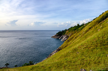 Fototapeta na wymiar Green hill with horizon sea on coastline at Krating cape