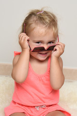 girl in pink with glasses