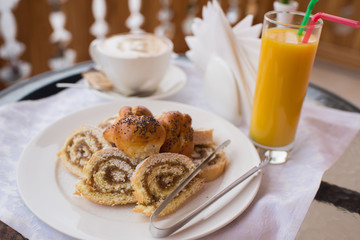 Sweet breakfast with coffee at the balcony with outdoor view