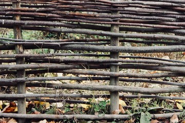 a fence made of branches