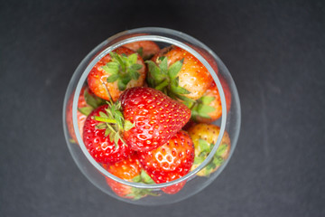 Red strawberry fruit for fresh food or a food ingredient can see at many markets or supermarket in Thailand 