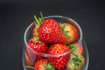Red strawberry fruit for fresh food or a food ingredient can see at many markets or supermarket in Thailand 