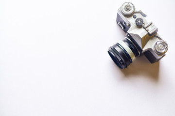 Dusty old Soviet camera "Zenit" on the white background