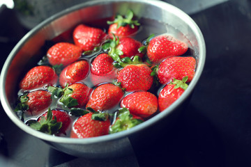 strawberry red fruit cleaning water