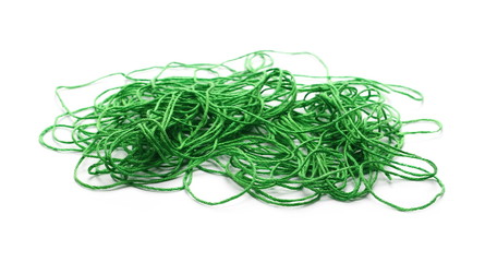 Green strings for sewing and knitting, isolated on white background