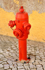 Red hydrant on the road