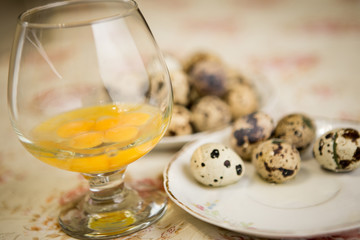 Glass full of eggs to quail.