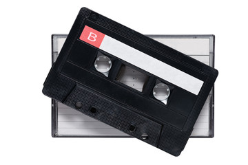 Obraz premium Cassette tape and box,top view. Black cassette tape side B laying on box with line white paper cover isolated on white background with clipping path.