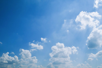 fluffy white cloud on clear blue sky