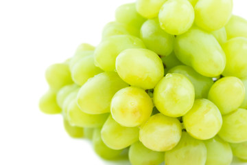 Juicy grape branch isolated on white