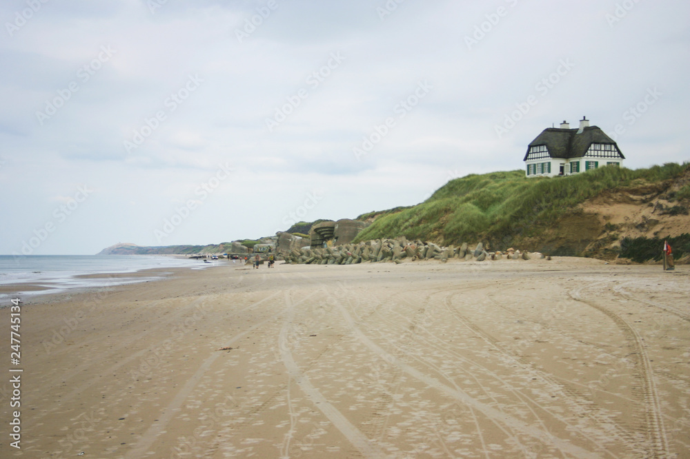 Wall mural a house on top the dunes with a epic view to the beach