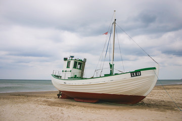 old fishing boat on the beach