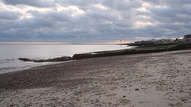 Felixstowe beach and seafront with beautiful cloudy sky at sunset