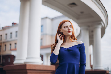 Portrait of gorgeous natural luxury glamour sexy lady outdoors in blue dress