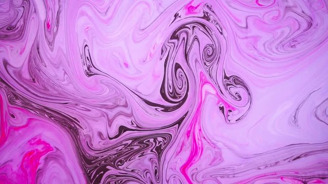 Abstract paint ink in motion. Psychedelic background footage. Moving colorful spots.