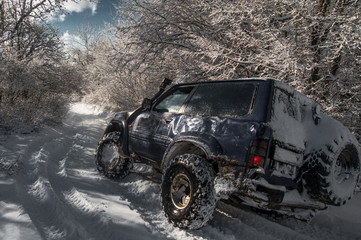 Off-road. Car in the winter mountains © Helga_Kyznetsova