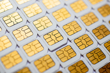 Many Micro SIM 3G for mobile over on white background.