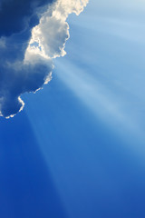 light rays of god on clear blue sky