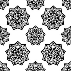 Seamless decorative ornament in ethnic oriental style. Circular pattern in form of mandala for Henna, Mehndi, tattoo, decoration.