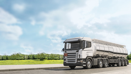 Tank truck driving on the country road, beautiful sunny day, 3d rendering