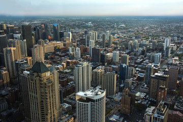 Chicago downtown aerial view at dusk with skyscrapers and city skyline at Michigan lakefront.