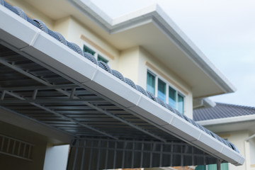 roof gutter on residential house building