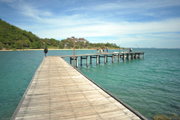 The beautiful wooden bridge extending into the sea. Khao Laem Ya National Park, Rayong, Thailand.