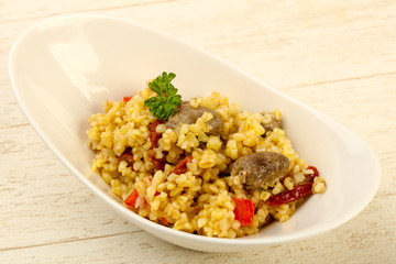 Bulgur with chicken hearts