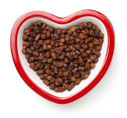 Bee Pollen Propolis In Heart Bowl Isolated