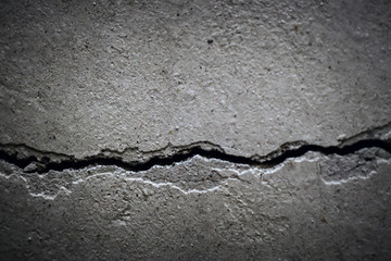 texture crack in concrete wall close-up