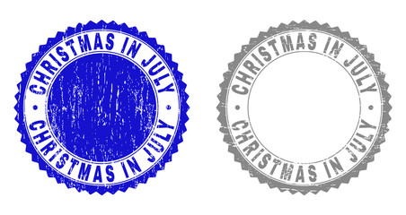 Grunge CHRISTMAS IN JULY stamp seals isolated on a white background. Rosette seals with grunge texture in blue and grey colors.