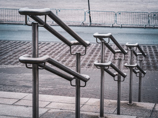 Metal handrails in the empty railway station