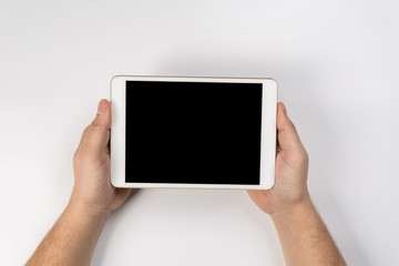 Man working with tablet, top view
