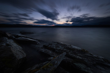 Sunset light and evening mood by the Jonsvatnet lake in Norway.