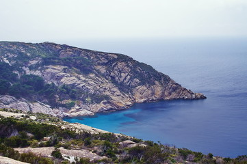 Fototapeta na wymiar Coastline of Montecristo Island, Tuscany, Italy