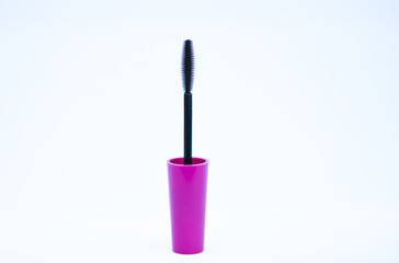 Beauty concept. Brush for applying mascara on eyelashes. Makeup beauty product. Mascara add volume and length to natural eyelashes. Mascara plastic brush. Black mascara brush white background